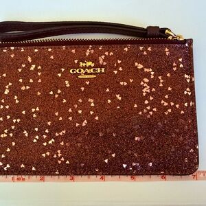 NEW Coach Sparkle Wristlet in rose colored with pink sequence hearts